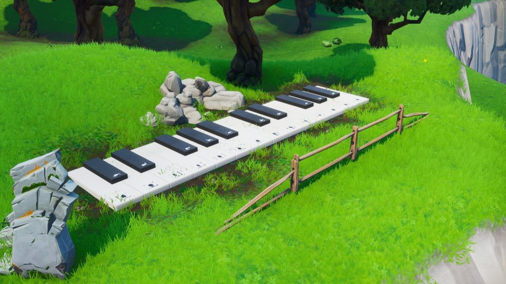 Fortnite Big Piano Location 1024x576 - Visit an Oversized Phone, Big Piano, and Giant Dancing Fish Trophy in Fortnite